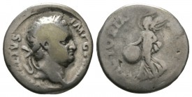 Vitellius (AD 69), Denarius, Lugdunum, c. March-July AD 69, 3.07g, 17mm. Laureate head right, small globe at point of neck / Victory advancing left, h...
