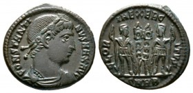 Constantine I (307/310-337), Follis, Heraclea, 330-3, 2.64g, 17mm. Rosette-diademed, draped and cuirassed bust right / Two soldiers flanking two stand...