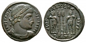 Constantine I (307/310-337), Follis, Antioch, 335-7, 2.20g, 17mm. Rosette-diademed, draped and cuirassed bust right / Two soldiers flanking two standa...
