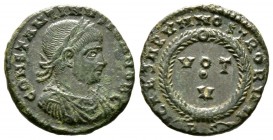 Constantine II (Caesar, 316-337), Follis, Rome, AD 321, 2.72g, 18mm. Laureate, draped and cuirassed bust right / Wreath enclosing VOT/ V in two lines;...