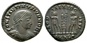 Constantine II (Caesar, 316-337), Follis, Cyzicus, 330-4, 2.38g, 17mm. Laureate, draped and cuirassed bust right / Two signa between two soldiers, eac...