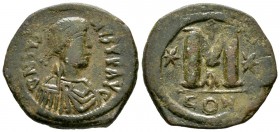 Justinian I (527-565), AE Follis, 40 Nummi, Constantinople, 527-538, 18.18g, 34mm. Pearl-diademed, draped and cuirassed bust right / Large M; cross ab...