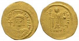 Maurice Tiberius (582-602), Solidus, Constantinople, 583/4-602, 4.50g, 22mm. Helmeted, draped and cuirassed bust facing, holding globus cruciger / Ang...