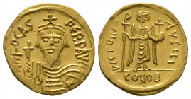Phocas (602-610), Solidus, Constantinople, 607-609, 4.39g, 20mm. Crowned, draped and cuirassed bust facing, holding globus cruciger / Angel standing f...