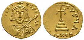 Tiberius III (698-705), Solidus, Constantinople, 4.36g, 19mm. Crowned and cuirassed facing bust, holding spear in right hand and shield decorated with...