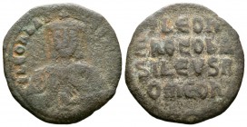 Leo VI (886-912), AE Follis /40 Nummi, Constantinople, 6.43g, 26mm. Facing bust, wearing crown and chlamys, holding akakia / Legend in four lines acro...