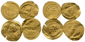 Lot of 4 Byzantine AV Tremissis, including Justinian I, Maurice Tiberius (2) and Phocas. Fine to near Very fine