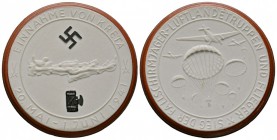 Germany, Kreta. Conquest of Crete Medal, 1941. White Porcelain, with red rim and black highlights, 50mm. Relief map of Crete between swastika and fasc...