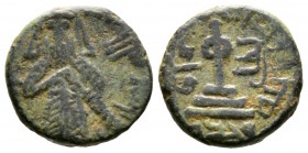 Arab-Byzantine, fals, mint of Latai?, standing caliph type, reverse with transformed cross, 3.61g Struck on a short flan otherwise about Very Fine and...