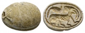 Second Intermediate Period, c. 1650-1550 B.C. Steatite scarab (15x11mm). Base engraved with a antelope right, head turned to left, and a lizard (?) on...