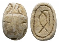 Second Intermediate Period, c. 1650-1550 B.C. Steatite scarab (11x8mm). Base engraved with a fish. Intact, once glazed, pierced for mounting. From an ...