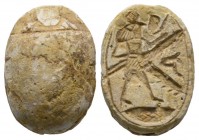 Second Intermediate Period, c. 1650-1550 B.C. Steatite scarab (19x14mm). Base engraved with a well detailed standing Ra. Intact, although worn and wit...