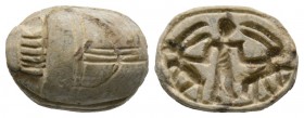 Second Intermediate Period, c. 1650-1550 B.C. Steatite scarab (16x12mm). Base engraved with a man and two ibexes. Intact, once glazed, pierced for mou...