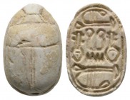 Second Intermediate Period, c. 1650-1550 B.C. Steatite scarab (18x12mm). Base engraved with protective signs including goodness and the powerful sign ...