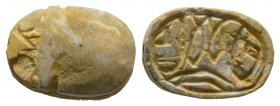 Second Intermediate Period, c. 1650-1550 B.C. Steatite scarab (15x10mm). Base engraved with protective signs. Intact, once glazed, pierced for mountin...