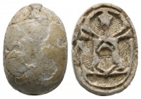 Second Intermediate Period, c. 1650-1550 B.C. Steatite scarab (20x14mm). Base decorate with a scarab in the centre surrounded by four Uraei (Royal cob...
