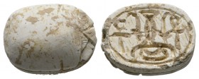 Second Intermediate Period, c. 1650-1550 B.C. Steatite scarab (18x13mm). Base engraved with protective and good luck signs: king, prosperity, gold and...