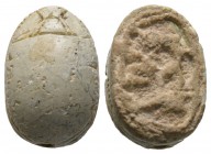 Second Intermediate Period, c. 1650-1550 B.C. Steatite scarab (20x13mm). Base difficult to read due to deposits. Intact, once glazed, pierced for moun...