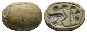 New Kingdom, c. 1550-1075 B.C. Steatite scarab (16x11mm). Base engraved with a shorter version of the formula 'beautiful is the son of amun ra'. Intac...