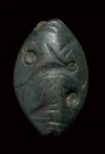 A minoan amygdaloid green jasper engraved seal.Fish with talismanic symbols .