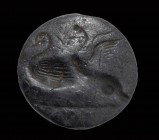 A minoan hematite engraved seal. Two swans.