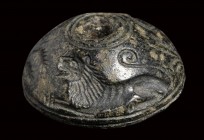 An early greek serpentine engraved seal. Hunting scene.