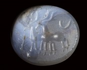 A graeco persian chalcedony engraved seal. Two stags.