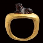 A fine greek garnet microsculpture mounted on a modern gold ring. Lioness.