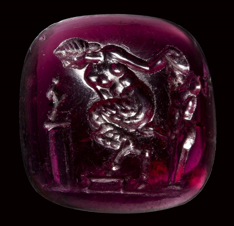 A fine late hellenistic garnet intaglio. Erotic scene with herm.

2nd - 1st ce...