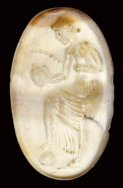 A roman italic banded agate intaglio. Muse. 

2nd century B.C.

9 x 15 x 2 m...