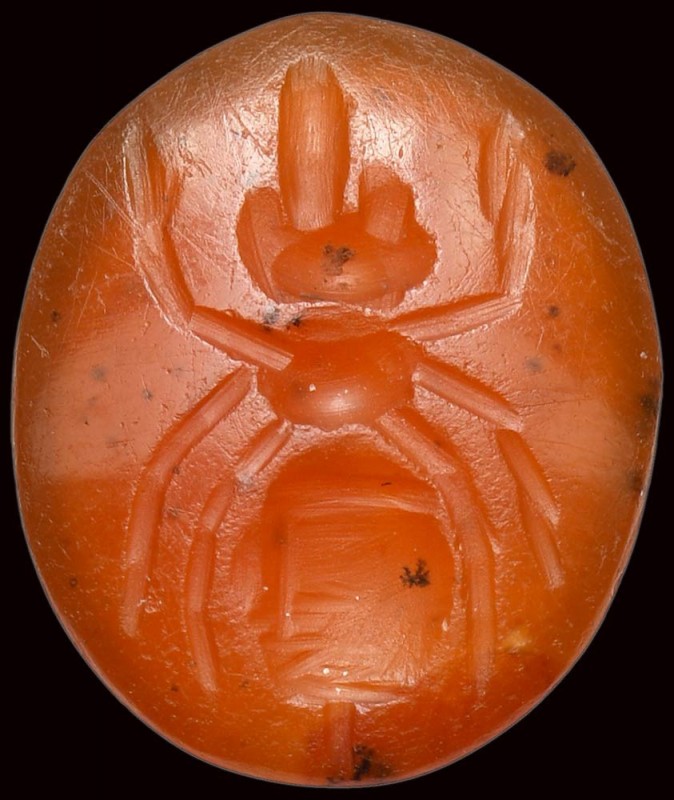 A roman carnelian intaglio. Ant.

2nd-3rd century A.D.

11 x 13 x 3 mm

Th...
