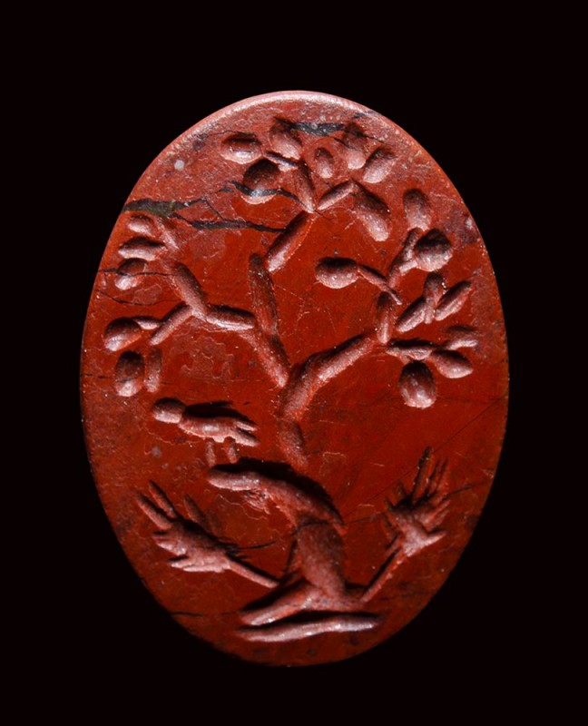 A roman red jasper. Bucolic scene.

2nd - 3rd century A.D.

6,5 x 9 x 1,5 mm...