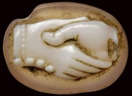 A late roman two-layers agate cameo. Dextrarum junctio.