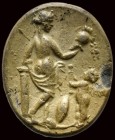 A roman burnt silver impression from an intaglio. Venus victrix with eros.