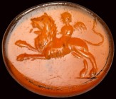 A roman carnelian intaglio. Eros on a lion.