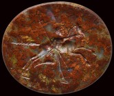 A fine roman red jasper with green, yellow and transparent inclusions. A running figure with a galopping  horse.