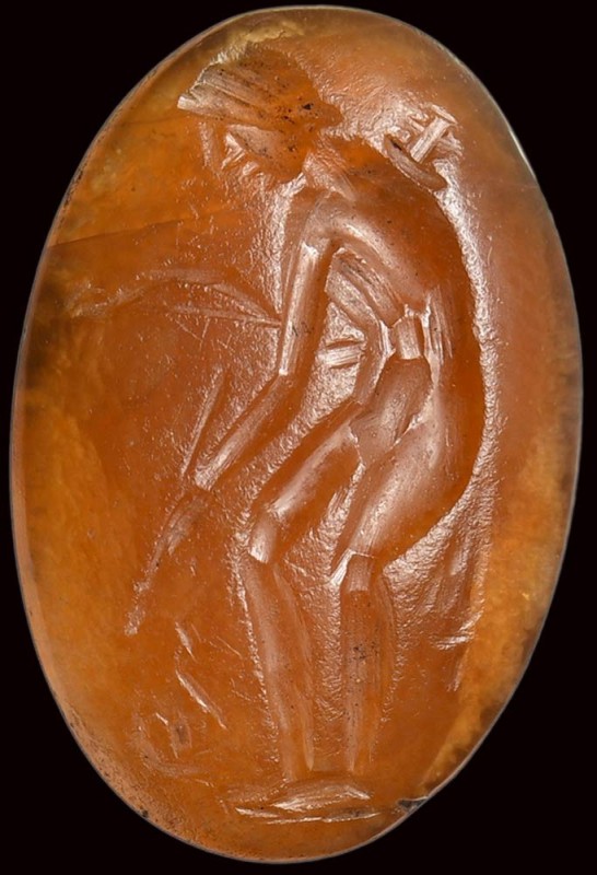 A roman agate intaglio. Apollo with a snake. 

2nd century A.D.

10 x 14 x 3...
