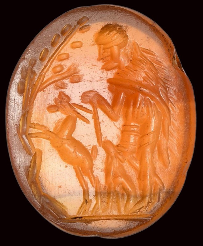A roman agate intaglio. Bucolic scene. 

2nd century A.D.

10 x 12 x 2,5 mm...