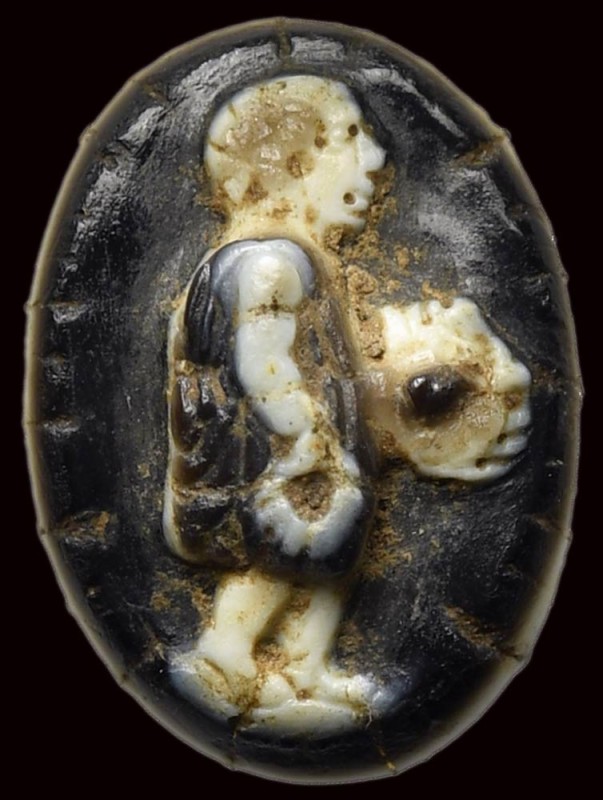 An unusual roman eight-layers banded agate cameo. Actor with mask and laurel wre...