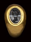 A roman banded agate intaglio set in ancient gold ring. Bust of Helios.