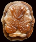 A  roman agate cameo. Four conjoined heads (Janus).