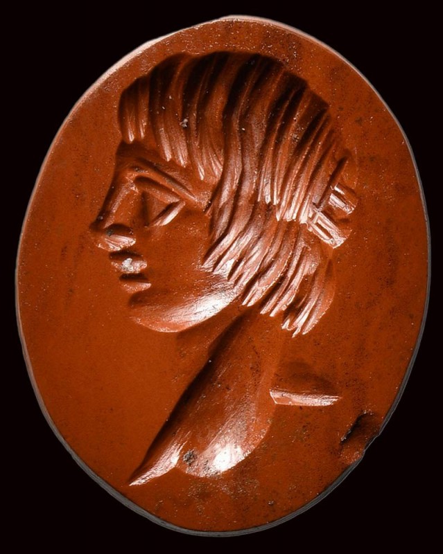 A roman red jasper intaglio. Bust of ephebus. 

2nd century A.D.

10 x 13 x ...