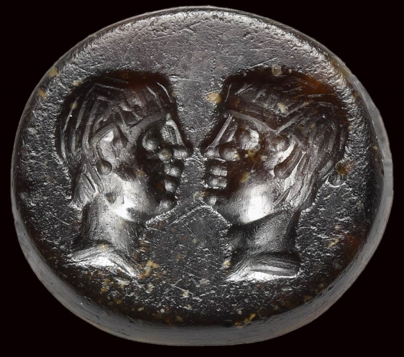 A roman republican sard intaglio. Two male portraits.

1st century B.C.

12 ...