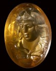 A fine citrine quartz roman intaglio. Bust of Africa - Lybia.