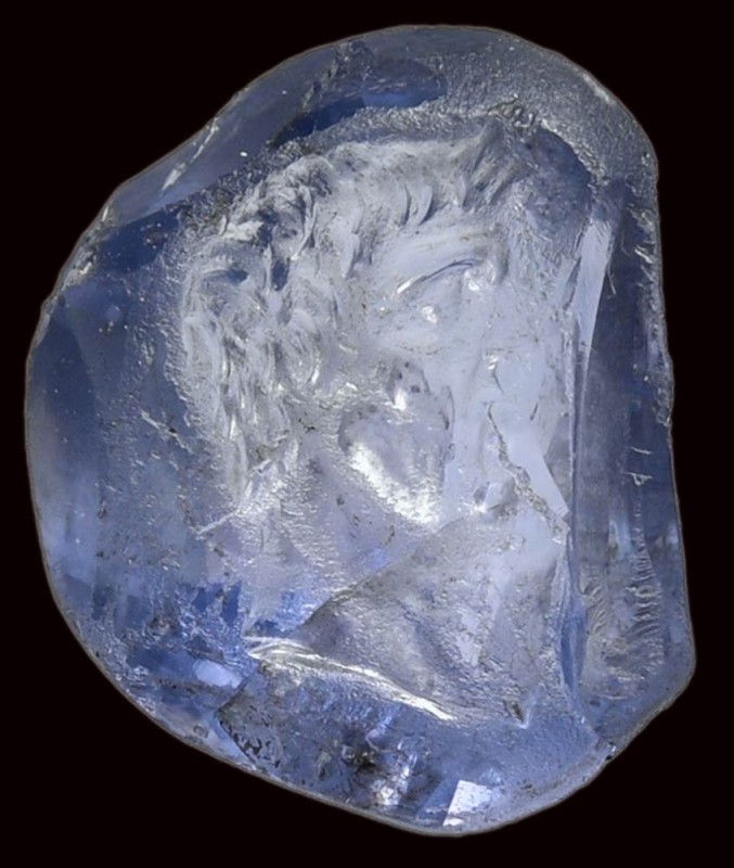 A roman sapphire intaglio. Bust of male ruler. 

End of 1st century B.C.

6 ...