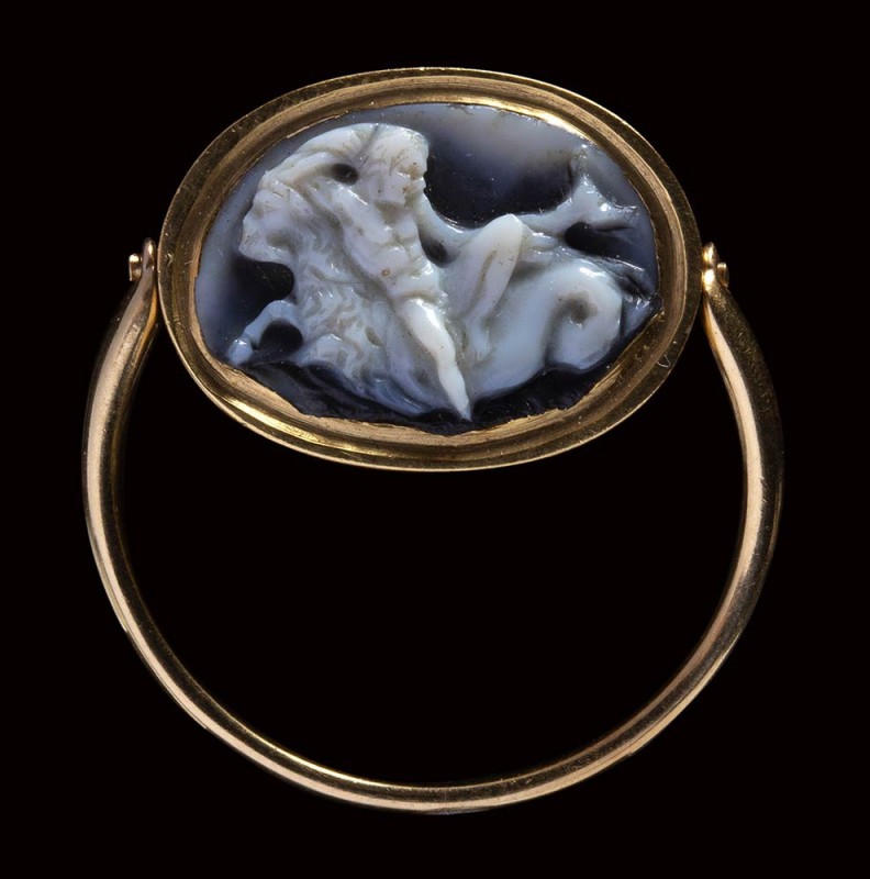 An roman agate cameo mounted on a modern gold ring. A youth on a seagoat.

2nd...