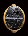 A roman banded agate intaglio set in a gold ring. Ajax with Cassandra.