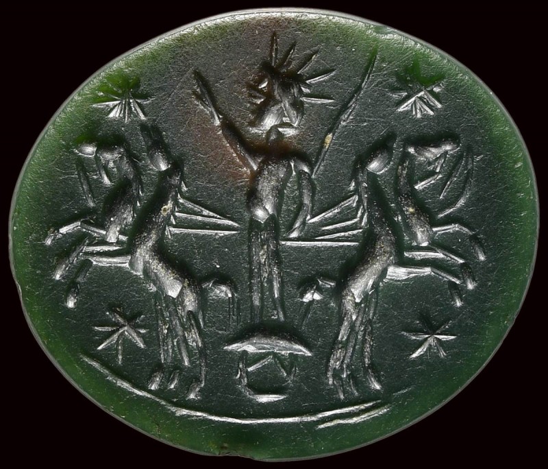 A roman green jasper astrological intaglio. Helios with solar quadriga. 

2nd ...