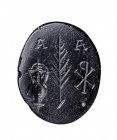 A late roman black agate intaglio. Martyrium Emblema.