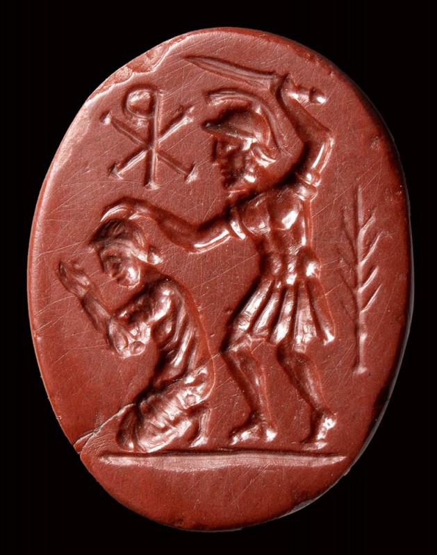 A late roman red jasper intaglio. Martyrum scene with chi-rho.

3rd-4th centur...